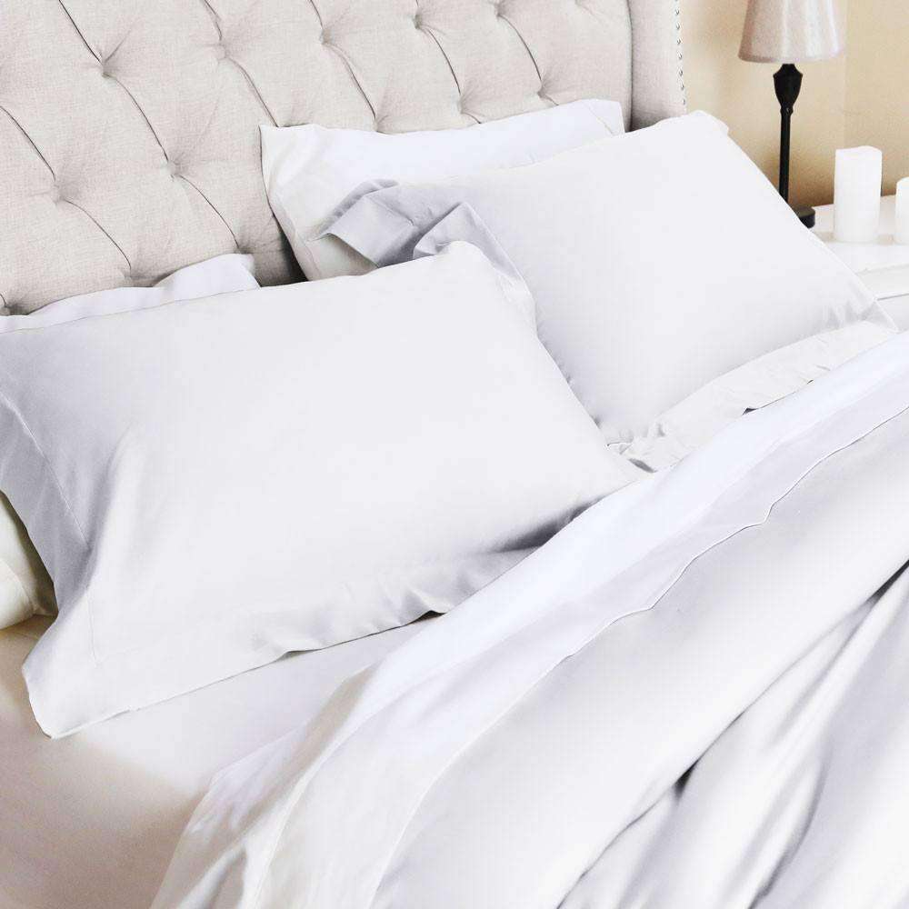 https://luxorlinens.com/cdn/shop/products/Valentino-Duvet-Solid-White_92b30b40-447e-450d-ab37-6de0ae87e57a_1600x.jpg?v=1597326270